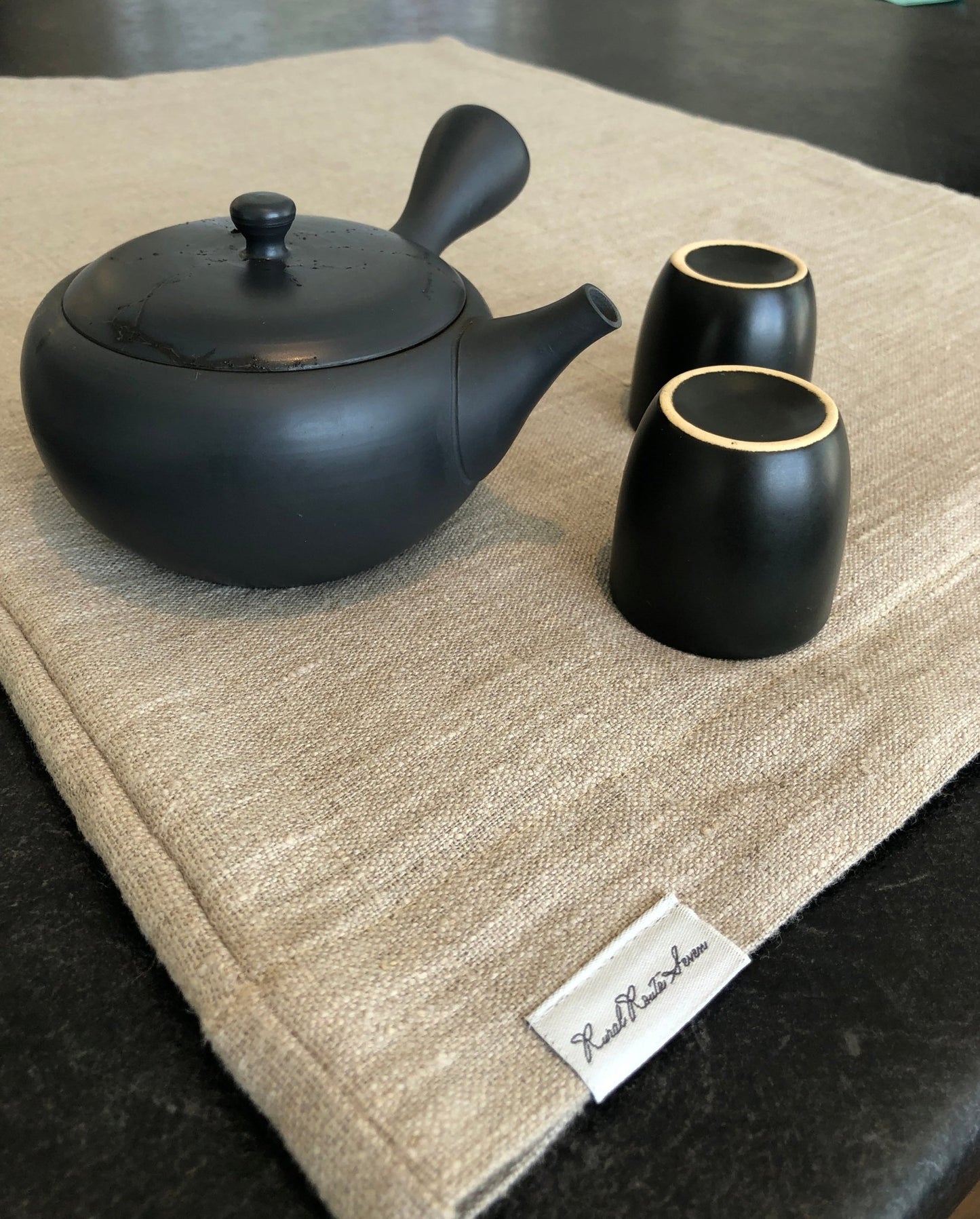 Made in Canada European Natural Flax Linen & Wool Dish Drying Mat with Rural Route Seven label and black Japanese tea set